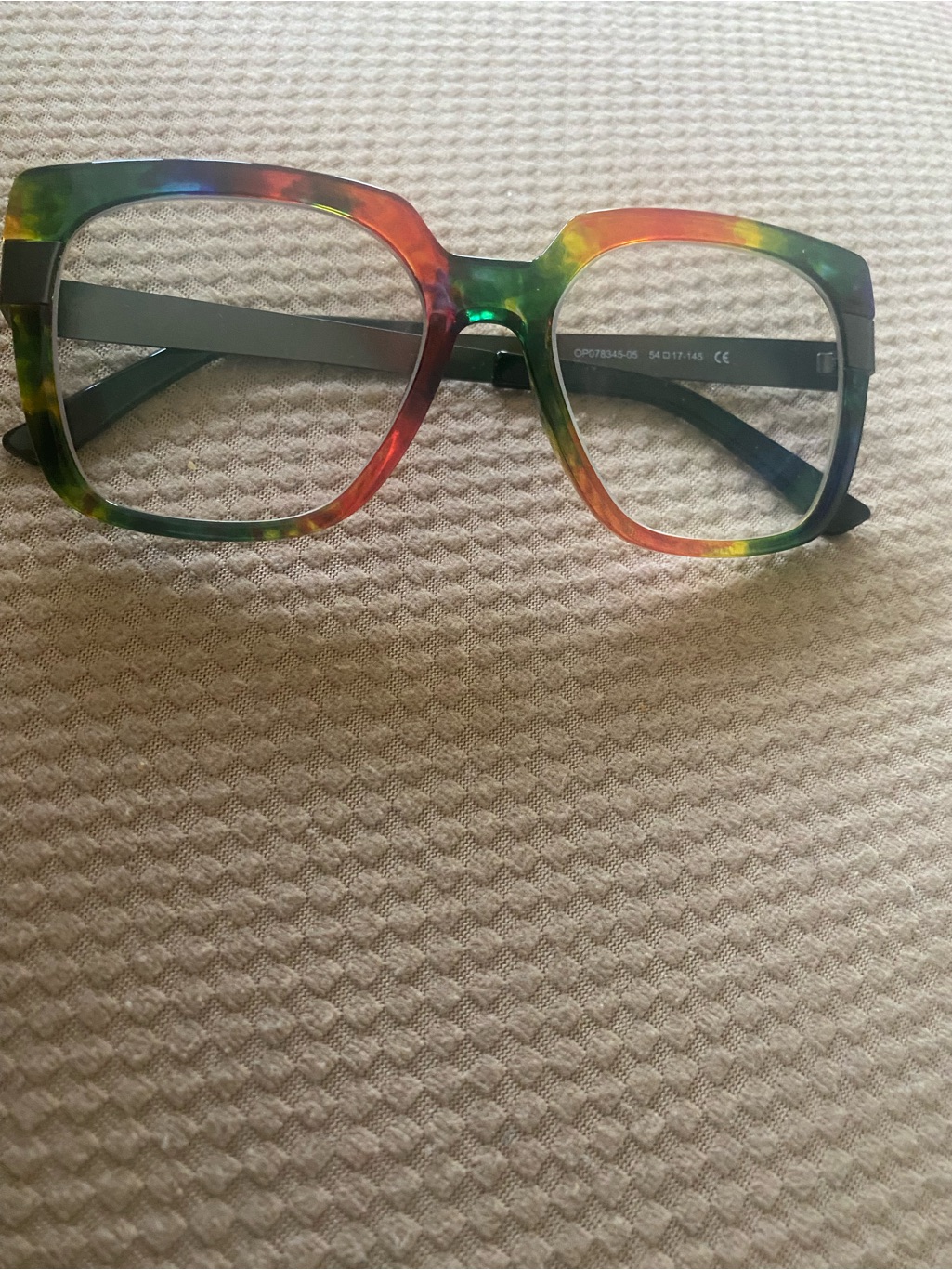 Designer Glasses In Orange Green And Gold Frames. Readers With Mid Level Lens